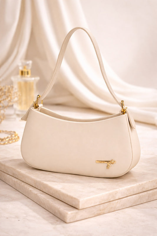 Elegant Ivory Shoulder Bag with Gold Accent Charm ✨